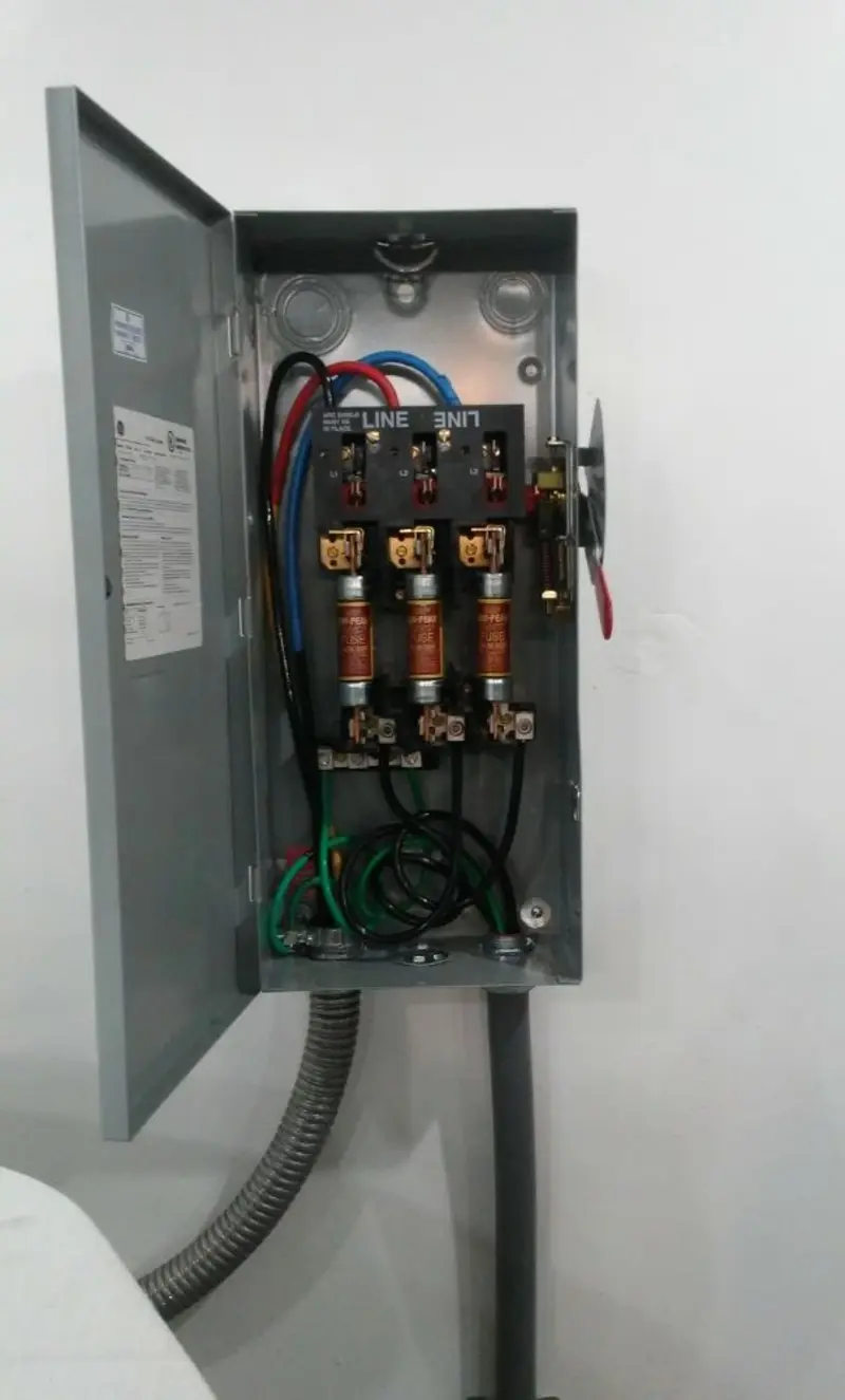 Three-phase disconnect switch installed for Smoke Detector Installation in Tulare