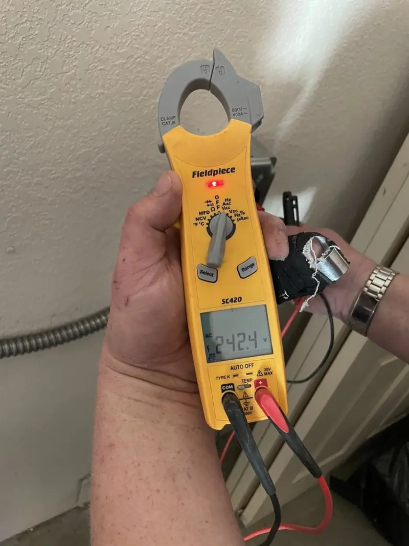Voltage testing with clamp meter during Generator Installation in Tulare